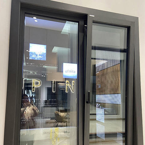 Rothnow® 50 Series aluminum tilt and turn window in black, 1000mm x 1000mm, showing the sleek window frame and open tilt position.