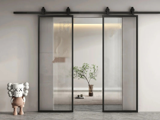 White Rothnow aluminum barn door with clear glass, 16x45 series slim frame American style for interior use.