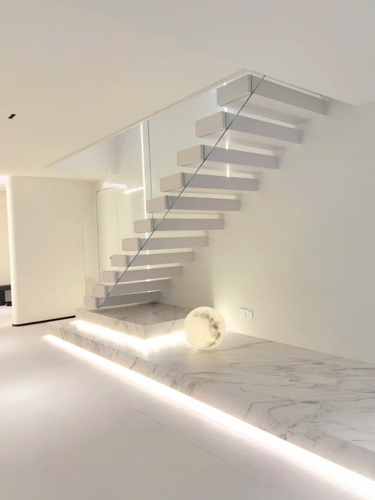 Rothnow® Stone Floating Staircase RNFS05 with black finish, modern staircase design, showcasing sleek floating steps.