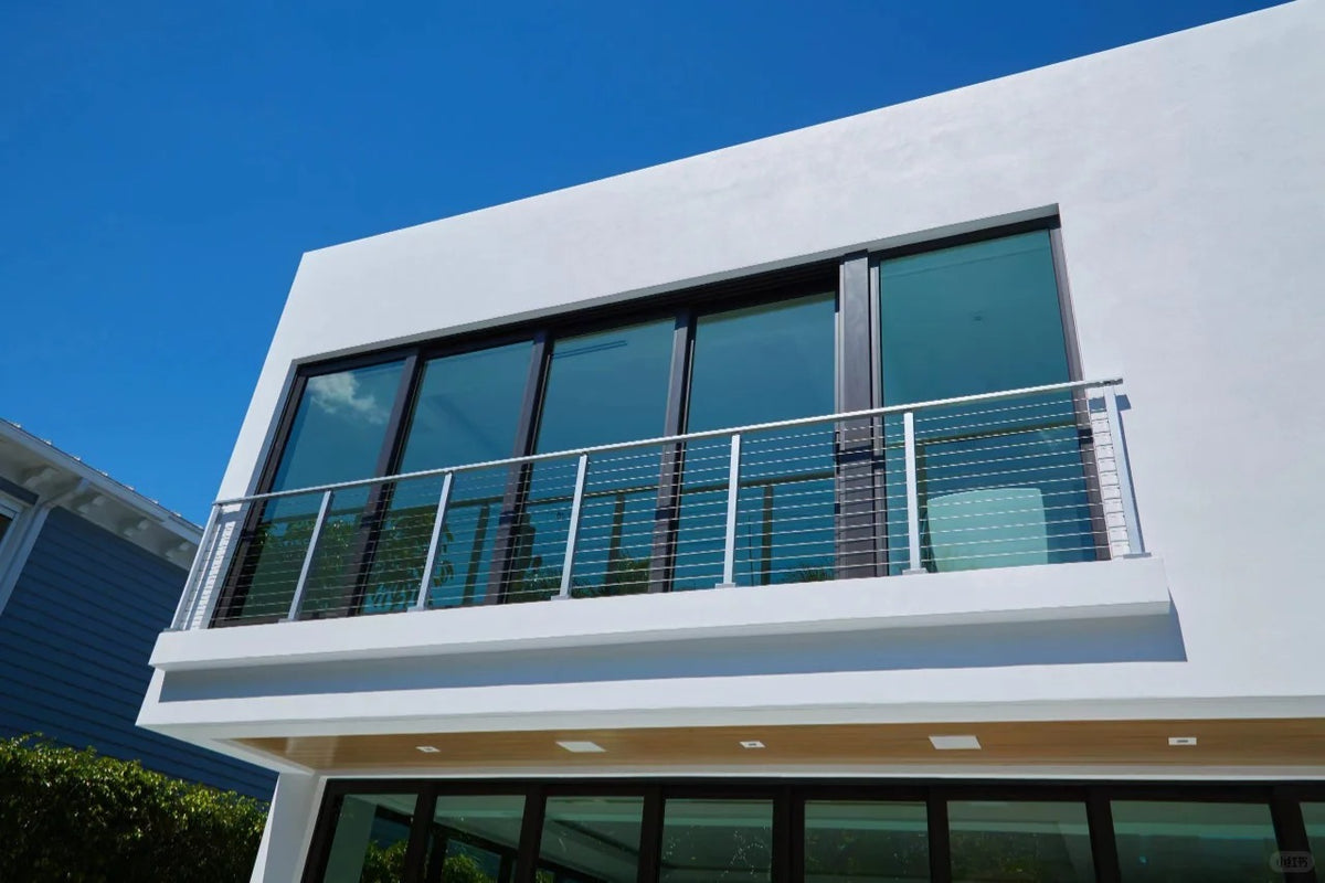 Rothnow Wire Cable Railing RNWR04 balcony railing in black, with horizontal cables and sleek metal posts, designed for outdoor decks.