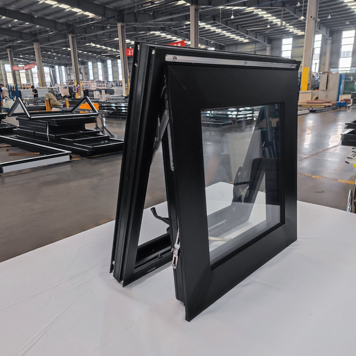 Rothnow® Aluminum Window 55 Series Chain Winder Awning Window in black, with open window showing chain mechanism and frame details