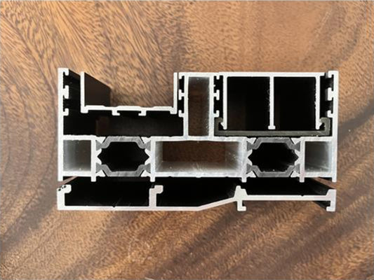 Rothnow Hurricane Proof Aluminum Door 125 Series, heavy sliding door in black, with reinforced frame and secure locking mechanism.