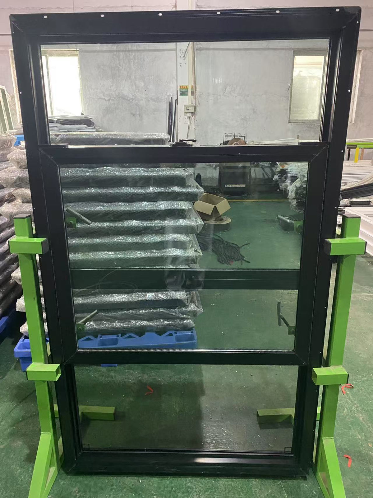 Black Rothnow UPVC vinyl window with integrated fin, 24x36 inches (610mm x 914mm), showing the window frame and glass.