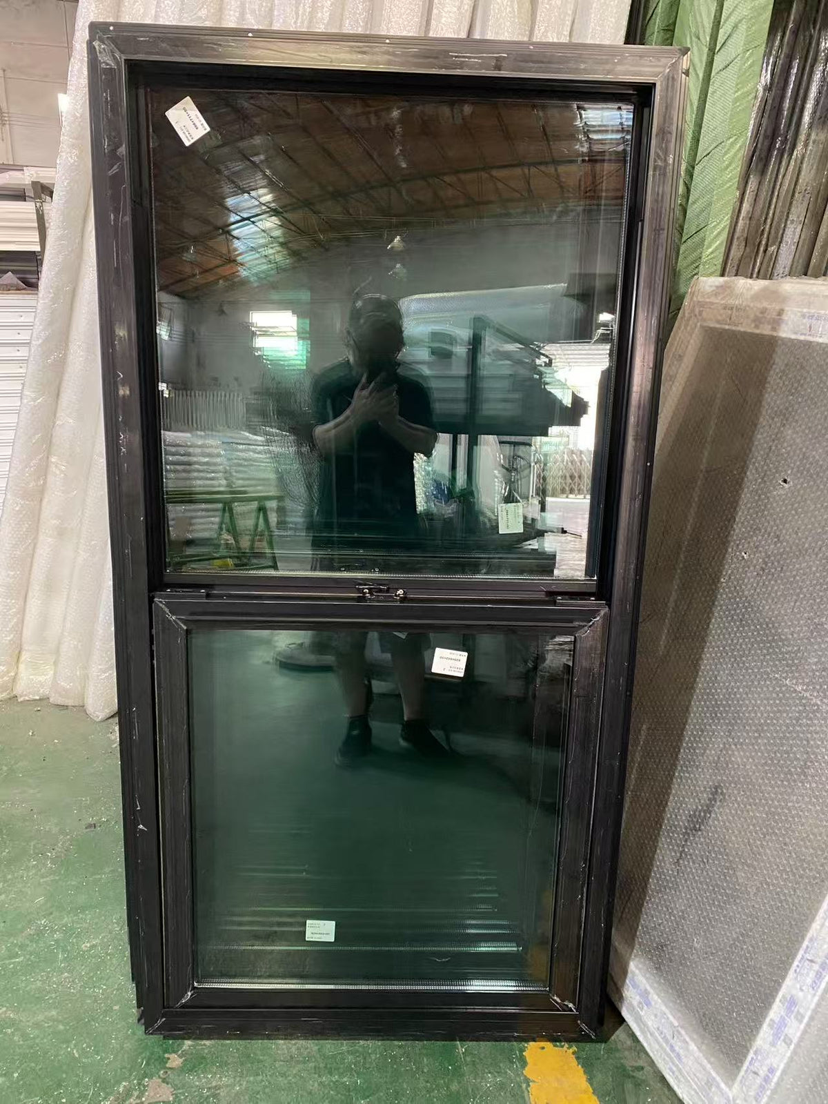 Black Rothnow UPVC vinyl window with integrated fin, measuring 24x36 inches, featuring a sleek and modern design.