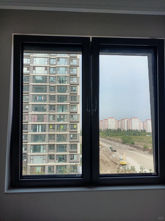Rothnow UPVC vinyl tilt and turn window in black, 24x36 inches, with openable sash and tilt function for ventilation.
