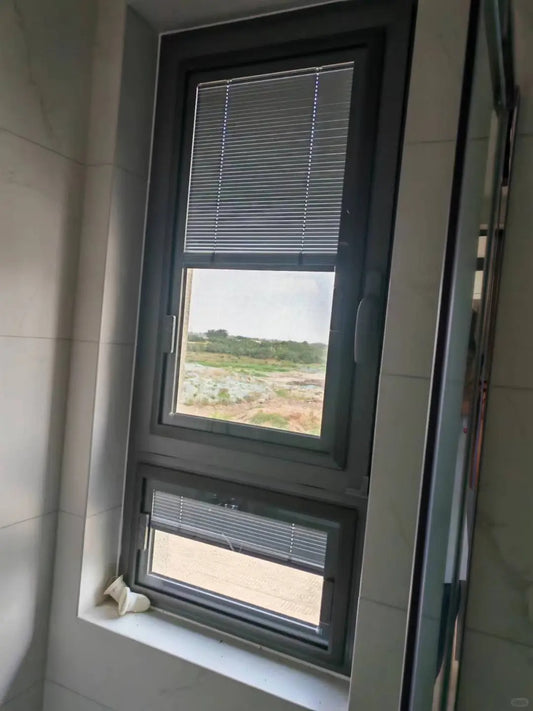 Rothnow UPVC vinyl tilt and turn window in black, 24 x 36 inches, with open tilt and turn mechanism, showing clean modern design.