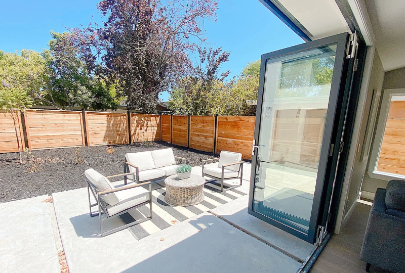 Rothnow® Aluminum 75 Series Bifold Exterior Door, black finish, 2400mm wide by 2300mm high, with sleek modern design.