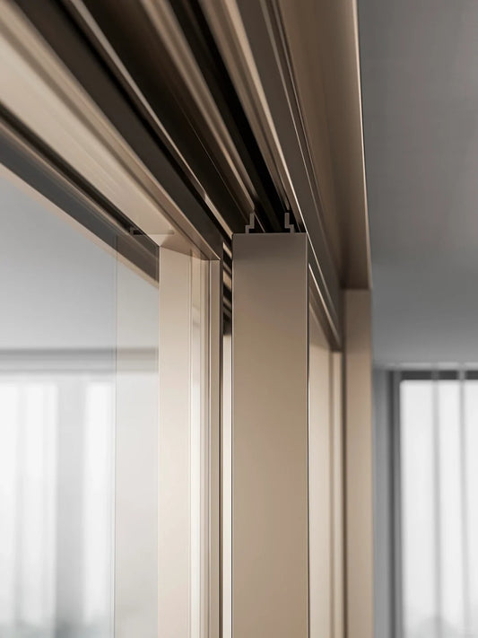 Rothnow® Aluminum Door from 16x28 Series with super slim frame, Alpha Gold finish, clear glass, white frame, sliding design.