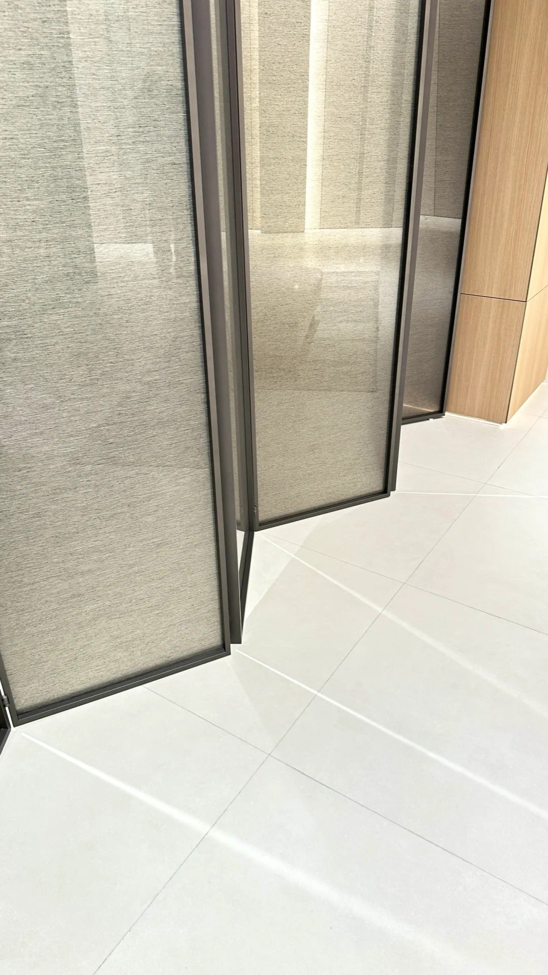Rothnow® Aluminum Bi-fold Door with clear glass panels, slim white frame, 16x45 series, 3940mm wide and 2280mm high.
