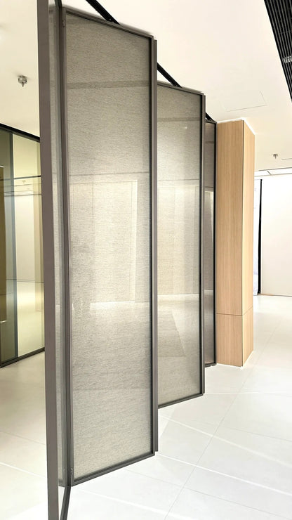 Rothnow® aluminum 16x45 series slim frame bi-fold door with clear glass, white finish, folded open to showcase modern design.