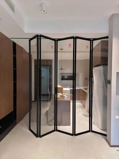 Rothnow® Aluminum 16x45 Series Slim Frame Bi-fold Folding Door with clear glass, black finish, white frame, and slim profile.