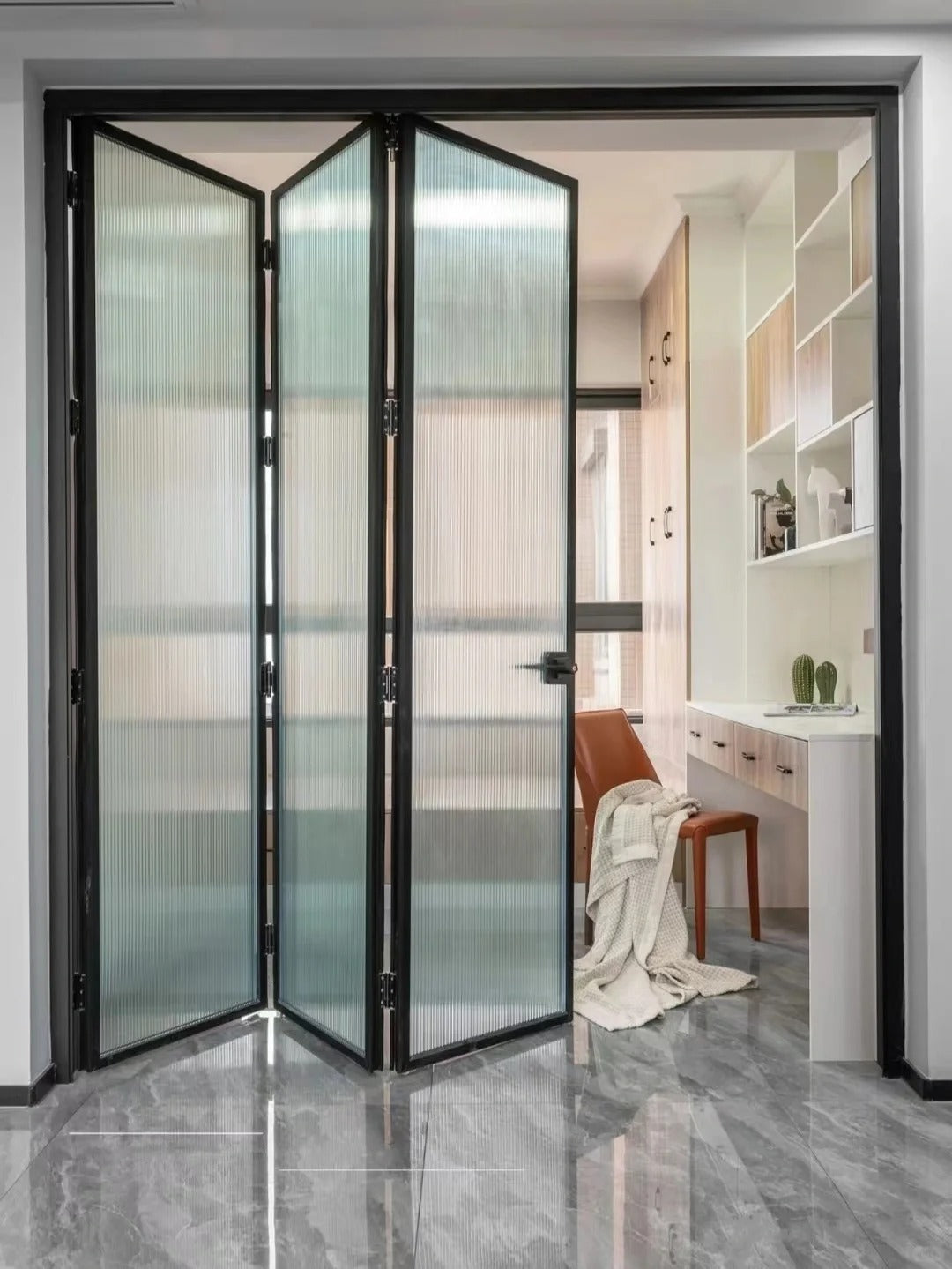 Rothnow aluminum 16x45 series slim frame bi-fold door with waved glass, white finish, folding design, and clear glass panels.