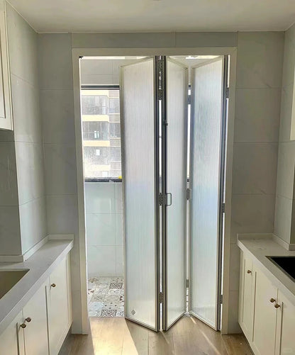 Rothnow aluminum 18x35 series slim frame bi-fold folding door with clear privacy glass, white finish, and modern design.