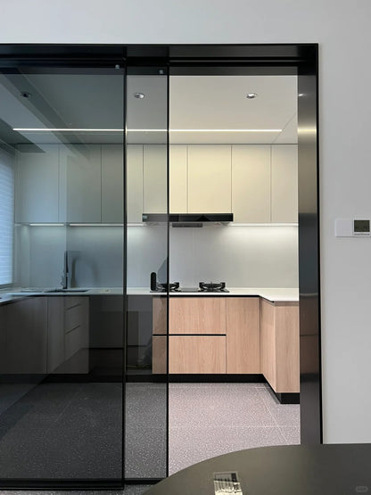 Rothnow® 7x45 Series aluminum black sliding door with clear glass, slim frame, and white skin for modern home interiors