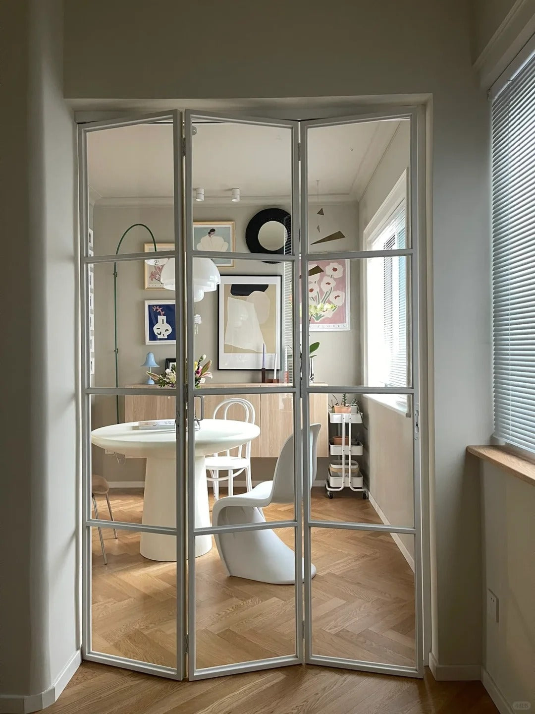Rothnow® customized French-style aluminum bi-fold door with slim frame, clear glass, white finish, 18x35 series, folding door design.