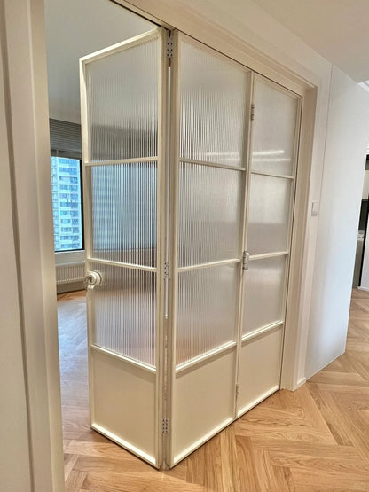 Rothnow French Style Aluminum Bi-fold Door with slim white frame, clear glass panels, for living room, 18x35 series.