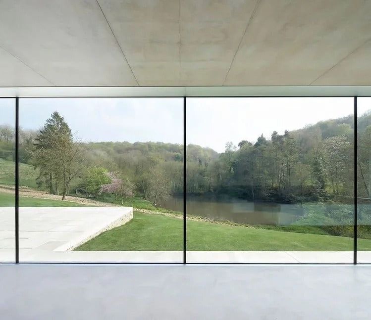 Rothnow® Heavy Aluminum 7x45 Series Slim Frame Sliding Door with clear glass and white finish, large modern door panel.