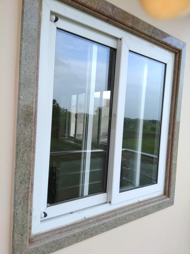 Rothnow UPVC vinyl sliding window in black, 72 x 30 inches, showing the sleek frame and glass pane of the Rothnow RNVW18 model.