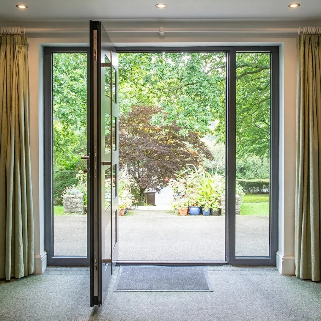 Brown Rothnow cast aluminum front door with pivot design, 800mm wide and 2100mm tall, featuring sturdy construction and a smooth finish.
