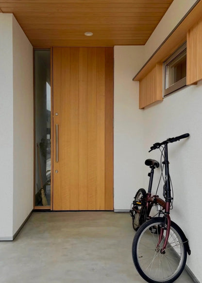 Brown Rothnow wood front entrance door, 800mm wide by 2100mm high, with swing door design and 150mm wall thickness.