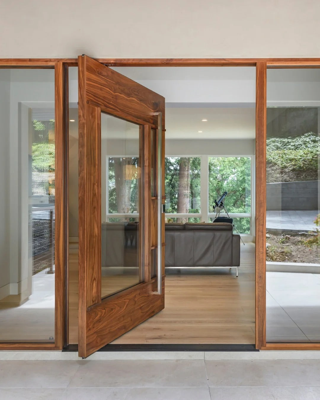 Rothnow wood front entrance door with brown finish, pivot design, 800mm wide and 2100mm tall with 150mm wall thickness.