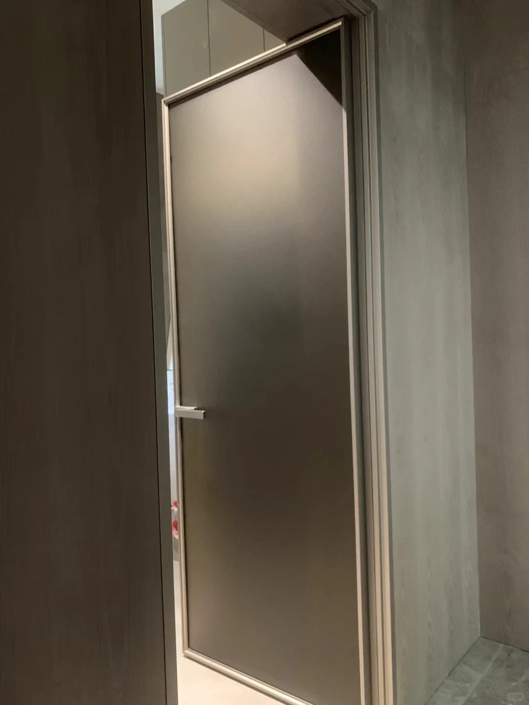 Rothnow aluminum door in 16x45 Series with bronze wired glass, white frame, and clear glass panel for modern interior or exterior use.