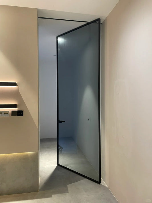 Rothnow Aluminum Door 16x45 Series pivot door with clear glass and crystal grey glass finish, white frame, and sleek modern design.