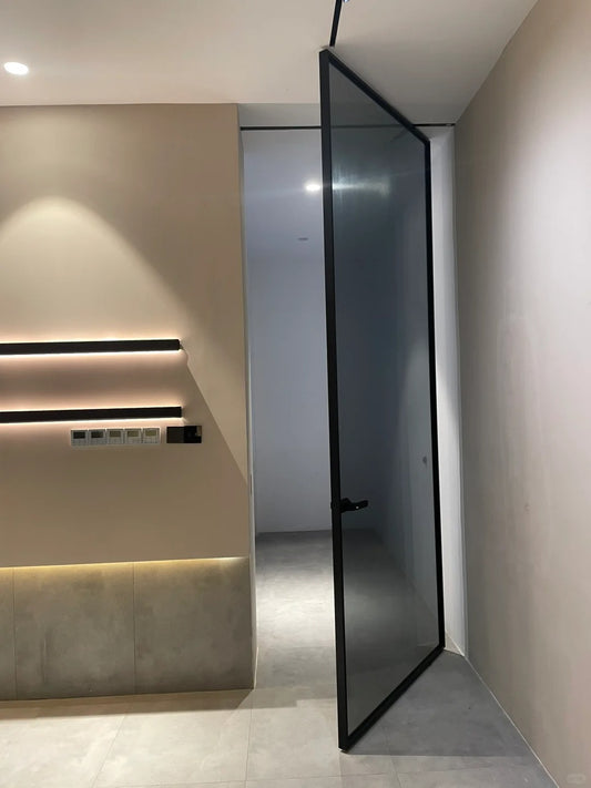Rothnow Aluminum Pivot Door with European Grey Glass, 16x45 Series, white finish, modern design, and clear glass panel.