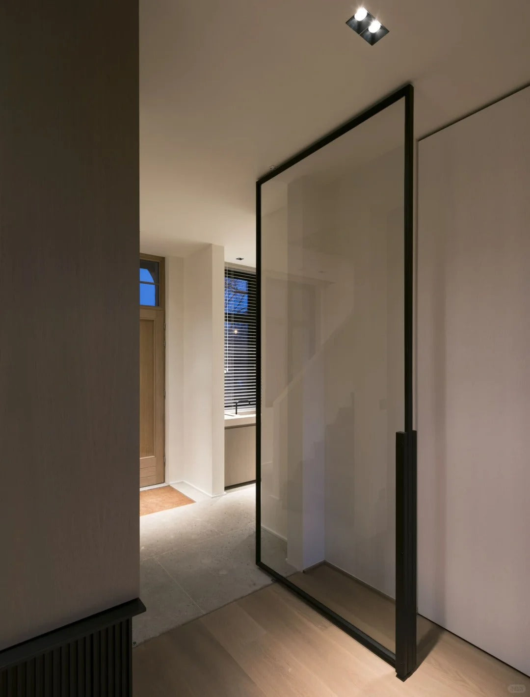 Rothnow® aluminum pivot door with transparent glass, 16x45 series, white finish, 820mm wide by 2220mm high, modern and sleek design.
