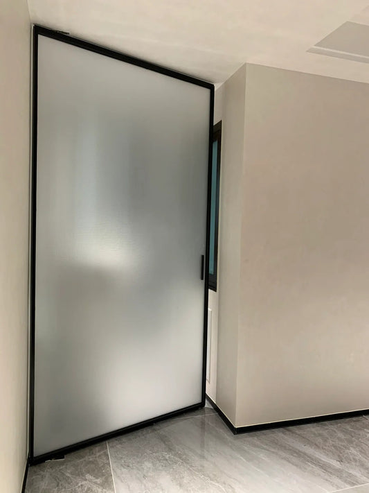 Rothnow Aluminum 16x45 Series Pivot Door with white oil sand finish and clear glass, showcasing modern design and sleek aesthetic.