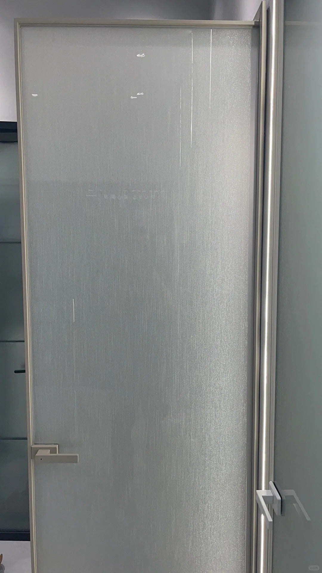 White Rothnow aluminum door with wired glass, 16x45 series, featuring clear glass and sleek white finish.