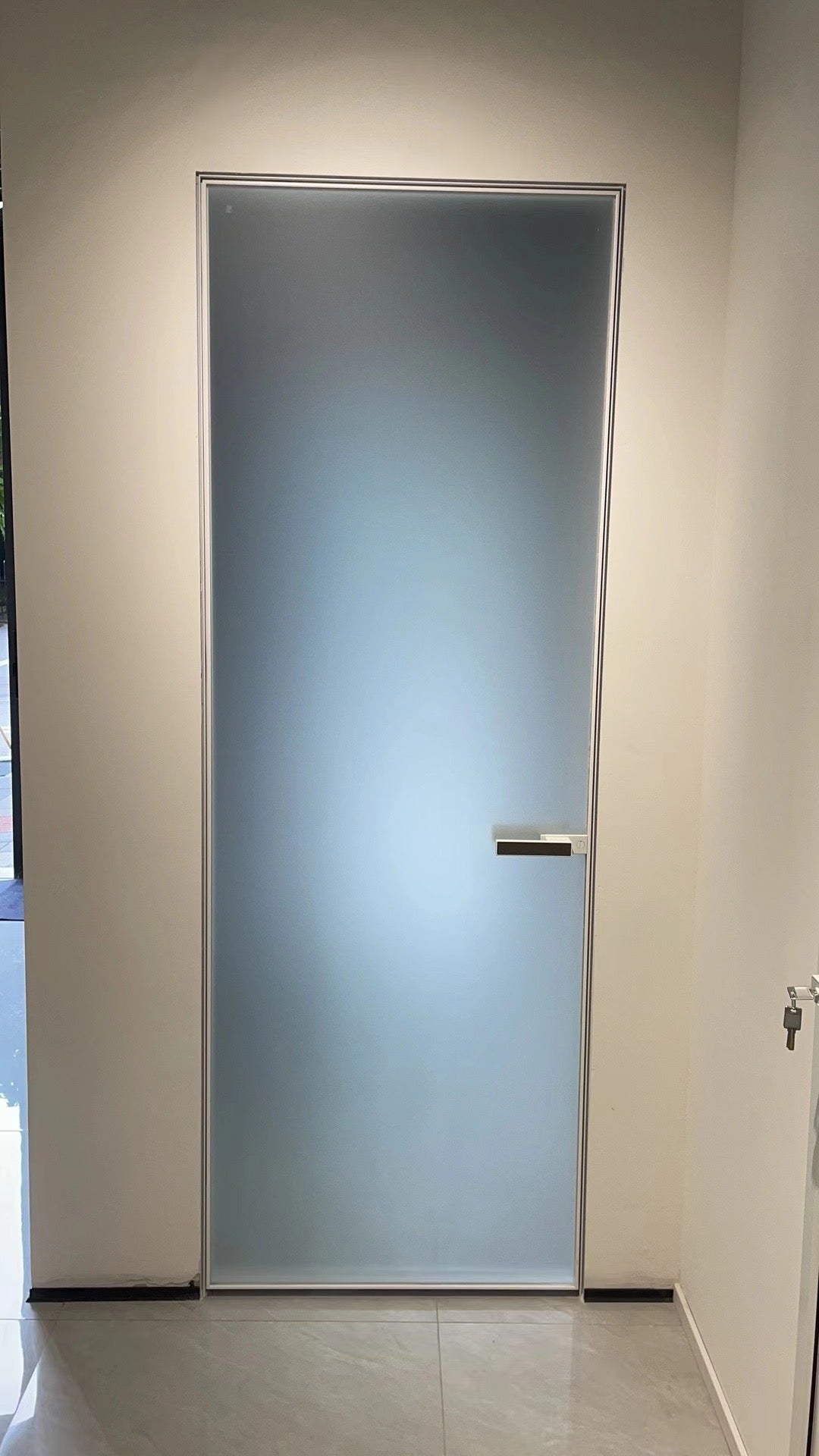 Rothnow® 7x45 Series aluminum swing door with clear glass skin, white super slim frame, dimensions 820mm W x 2220mm H.