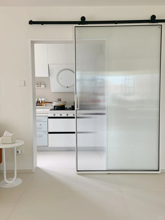 Rothnow® aluminum door from the 16x45 Series, white American-style slim frame barn door with clear glass panel.