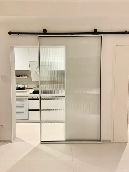 Rothnow® Aluminum Door from the 16x45 Series, American style slim frame barn door with clear glass and white finish.