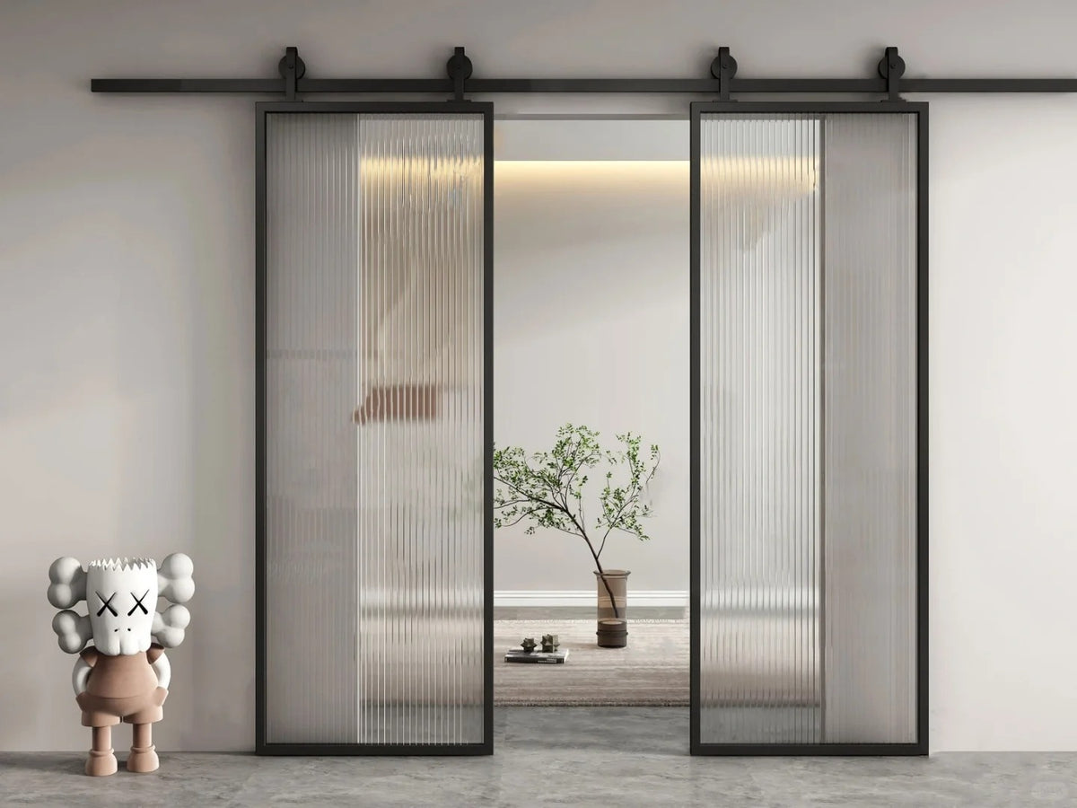 White Rothnow aluminum barn door with clear glass, 16x45 series slim frame American style for interior use.