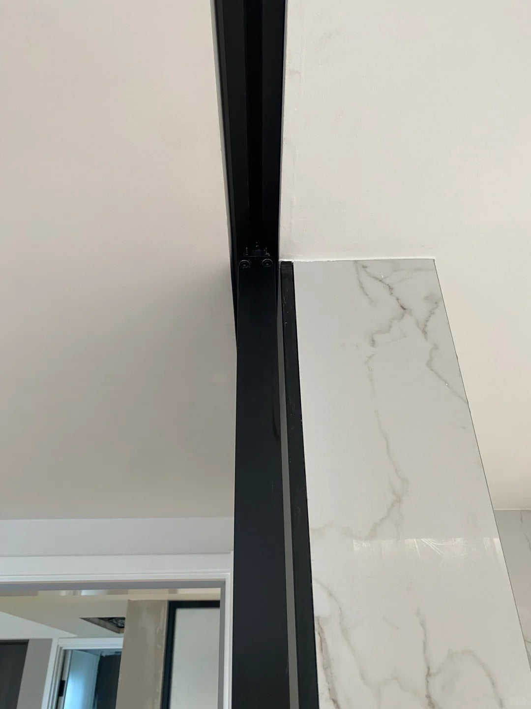Rothnow® aluminum barn door with clear glass, 16x45 series slim frame, white finish, suitable for living room interior.