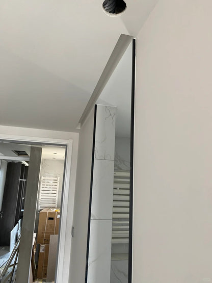 Rothnow® aluminum barn door with clear glass, 16x45 series slim frame design, ideal for living room interior decor.