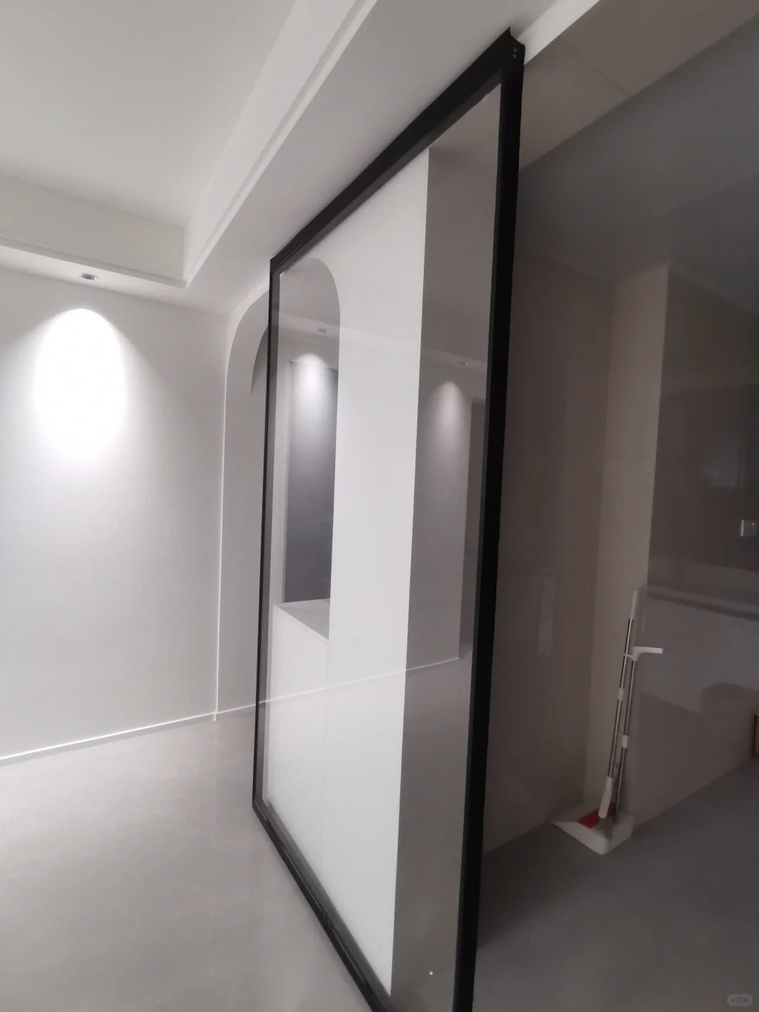 Rothnow Aluminum Door 16x45 Series with slim frame and transparent glass, white finish, modern ghost door design.