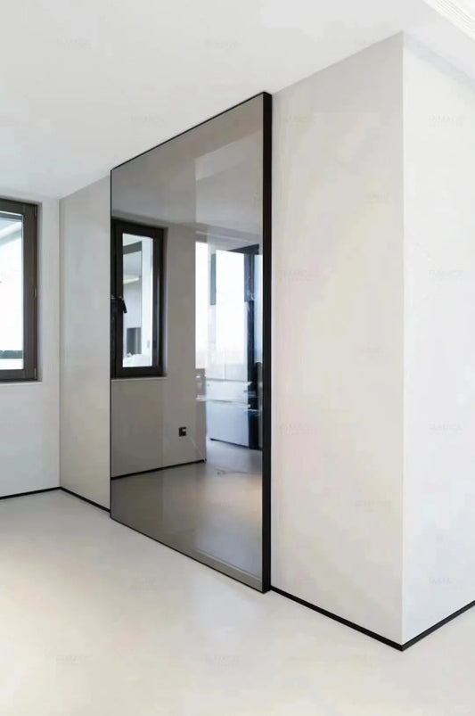 Rothnow® aluminum door with 7x45 series slim frame, mirrored glass, and clear glass skin, white finish, modern ghost door design.
