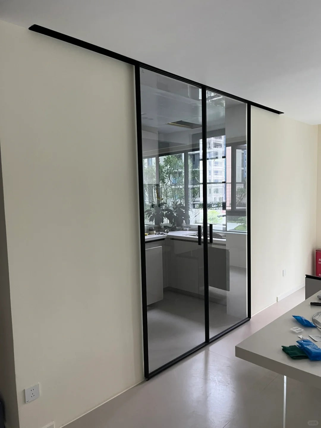 Rothnow® aluminum door with clear glass, white finish, 7x45 series super slim frame barn kitchen door, modern and sleek design.