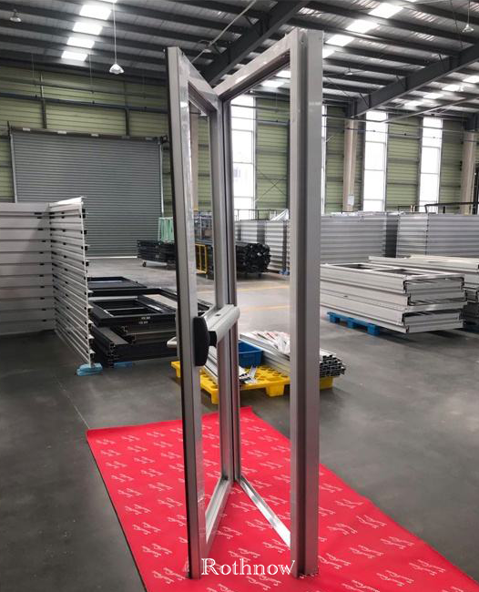 Rothnow aluminum 50 Series swing door with black finish, 900mm wide, 2200mm high, featuring push rod lock for secure entry.