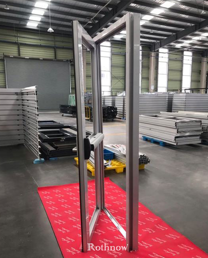 Rothnow aluminum 50 Series swing door with black finish, 900mm wide, 2200mm high, featuring push rod lock for secure entry.