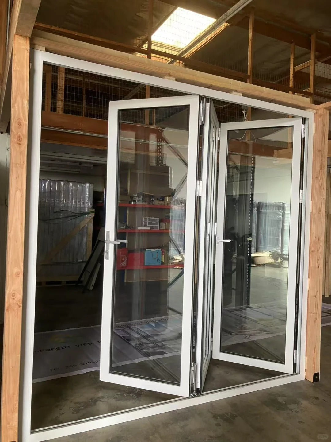 Rothnow Vinyl Door RN-VD-08 folding UPVC door, black, 900mm wide by 2200mm high, with a sleek, modern design.