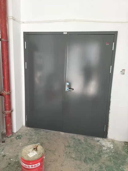 Rothnow steel fire-rated swing door with 990mm width, 2360mm height, and 150mm wall thickness, shown installed in a wall.