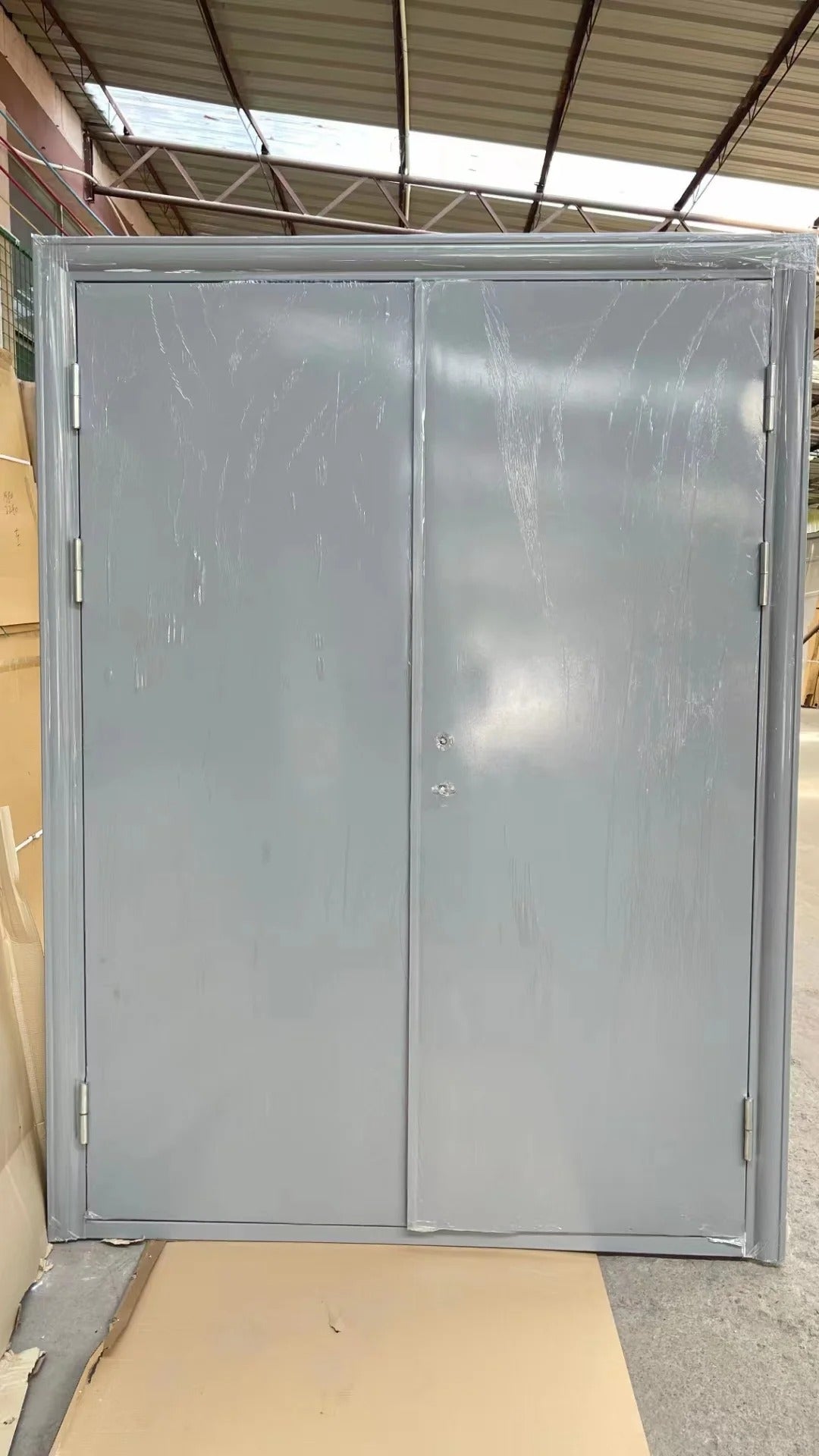 Rothnow® steel fire-rated swing door with 990mm width, 2360mm height, and 150mm wall thickness, designed for fire safety.
