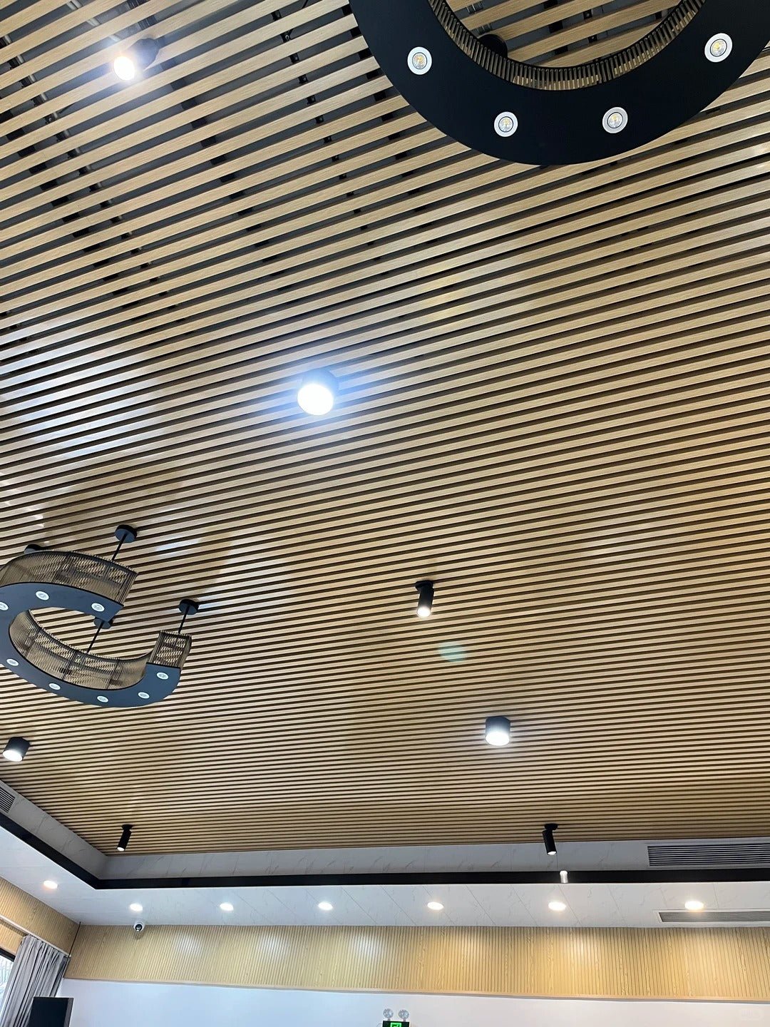 Black Rothnow aluminum ceiling panel from the Rothnow® Ceiling-RNAC04 series, customized size, with a smooth, modern finish.