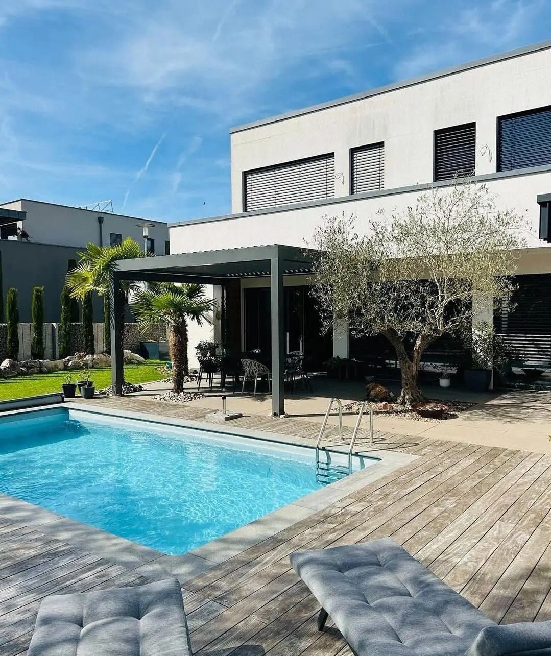 Black Rothnow aluminum louvered pergola with customizable size, featuring a sleek, modern design for outdoor shading and relaxation.