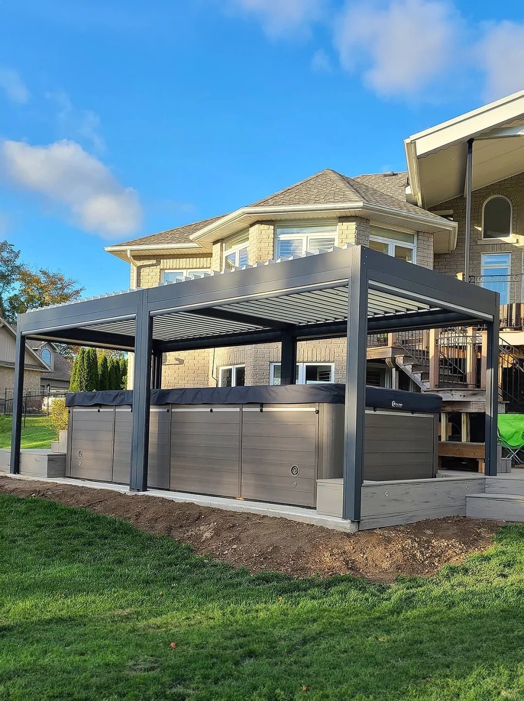 Black Rothnow aluminum pergola with sleek ceiling design, featuring a climate pavilion made of durable aluminum alloy.