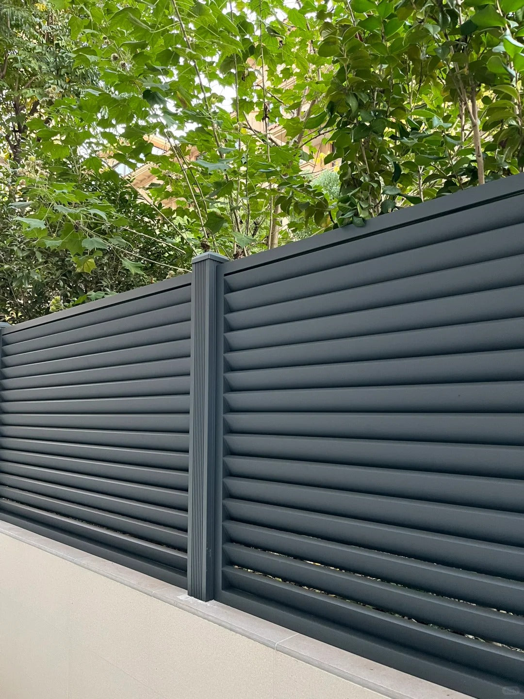 Black Rothnow aluminum railing with shutter design, customizable size, used as a durable outdoor fence or balcony railing.