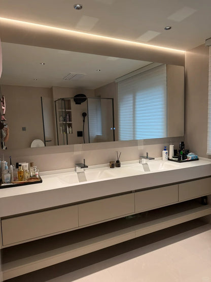 Black Rothnow bathroom vanity with a custom-sized railing, featuring a sleek and modern design for contemporary bathrooms.